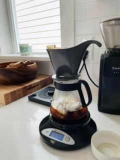 an image of a pour over coffee setup in a kitchen